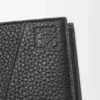 Cartera Puzzle con doble pliegue en piel de becerro granulada flexible, color negro