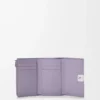 Cartera vertical pequeña Anagram en piel de becerro granulada Dirty Mauve Cartera vertical pequeña Anagram en piel de becerro granulada Dirty Mauve