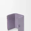Cartera vertical pequeña Anagram en piel de becerro granulada Dirty Mauve Cartera vertical pequeña Anagram en piel de becerro granulada Dirty Mauve