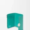 Cartera vertical pequeña Pebble en piel de becerro granulada Aquamarine Cartera vertical pequeña Pebble en piel de becerro granulada Aquamarine