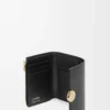 Cartera vertical pequeña Pebble en piel de becerro napa brillante Black