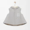 Chaleco con capucha en piel de oveja gris claro jaspeado Chaleco con capucha en piel de oveja gris claro jaspeado