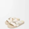 Chanclas espadrilles con forma de pétalo en suave piel de becerro. Blanco Chanclas espadrilles con forma de pétalo en suave piel de becerro. Blanco