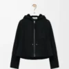Chaqueta con capucha de piel de oveja negra Chaqueta con capucha de piel de oveja negra