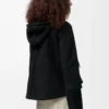 Chaqueta con capucha de piel de oveja negra Chaqueta con capucha de piel de oveja negra
