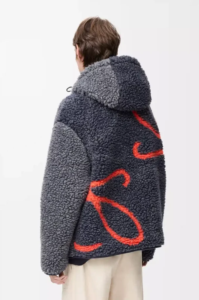 Chaqueta con capucha en mezcla de lana azul marino/naranja