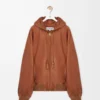Chaqueta con capucha en piel de cordero napa color tostado Chaqueta con capucha en piel de cordero napa color tostado