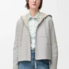 Chaqueta con capucha en piel de oveja gris claro jaspeado Chaqueta con capucha en piel de oveja gris claro jaspeado