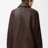 Chaqueta con lazo en piel de cordero napa color chocolate oscuro Chaqueta con lazo en piel de cordero napa color chocolate oscuro