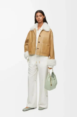 Chaqueta de piel de oveja blanca/dorada