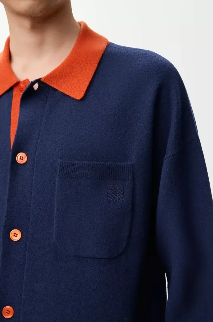 Cárdigan polo de lana azul marino/naranja