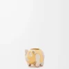 Dado pequeño con forma de animal en metal dorado/paladio