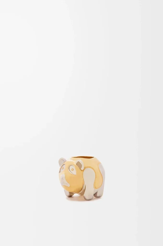 Dado pequeño con forma de animal en metal dorado/paladio