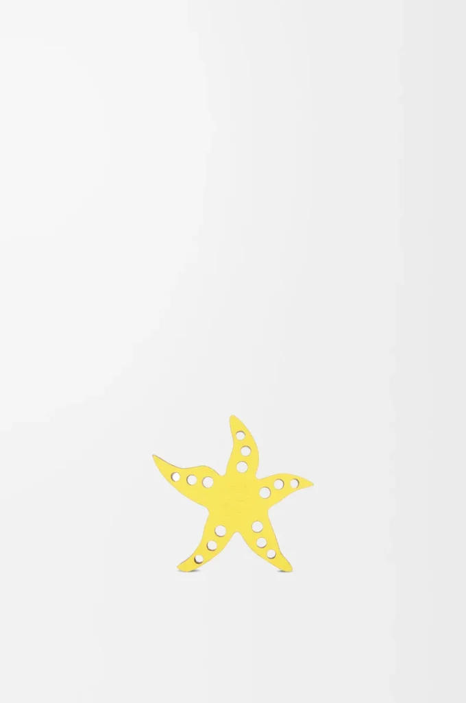 Dados con estrella de mar en piel de becerro amarillo/beige Dados con estrella de mar en piel de becerro amarillo/beige