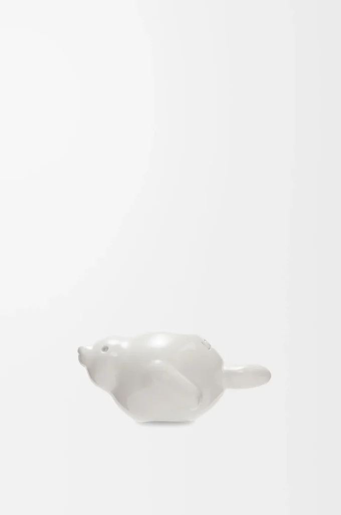 Dados con forma de foca en latón blanco suave Dados con forma de foca en latón blanco suave