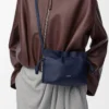 Mini bolso de mano Flamenco en piel de becerro napa azul abismo