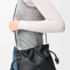 Mini bolso de mano Flamenco en piel de becerro napa negro