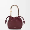Mini bolso Flamenco en suave piel de cordero napa burdeos oscuro Mini bolso Flamenco en suave piel de cordero napa burdeos oscuro
