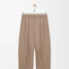 Pantalones acampanados de lana color arena