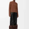 Pantalones con vuelta en piel de cordero napa. Negro Pantalones con vuelta en piel de cordero napa. Negro