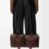 Pantalones con vuelta en piel de cordero napa. Negro Pantalones con vuelta en piel de cordero napa. Negro