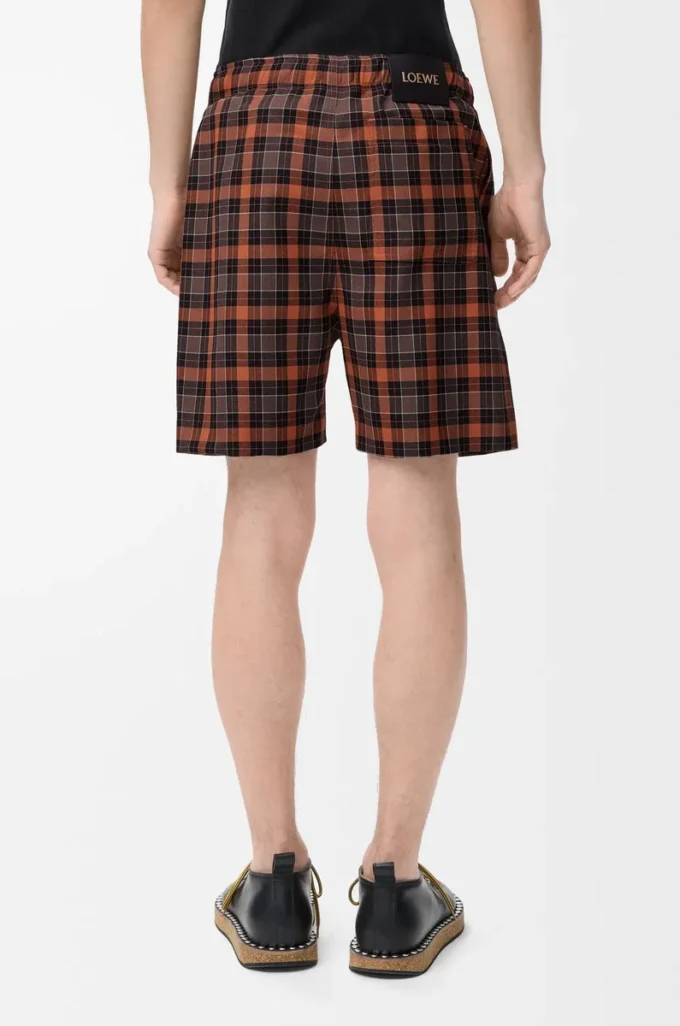 Pantalones cortos de mezcla de lana naranja/negro