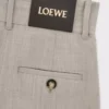 Pantalones cropped cruzados de lana en color beige claro jaspeado
