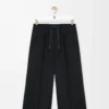 Pantalones cropped de viscosa elástica. Negro Pantalones cropped de viscosa elástica. Negro