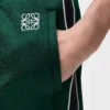 Pantalones de chándal de jersey técnico verde oscuro Pantalones de chándal de jersey técnico verde oscuro