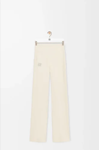 Pantalones suaves acampanados en jersey técnico marfil Pantalones suaves acampanados en jersey técnico marfil