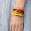 Pulsera doble trenzada en piel de becerro Naranja vivo/Amarillo Pulsera doble trenzada en piel de becerro Naranja vivo/Amarillo