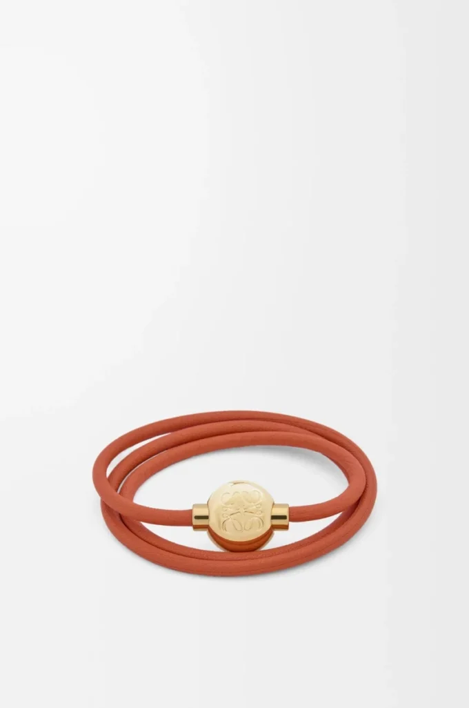 Pulsera Pebble de piel de becerro naranja/dorada Pulsera Pebble de piel de becerro naranja/dorada