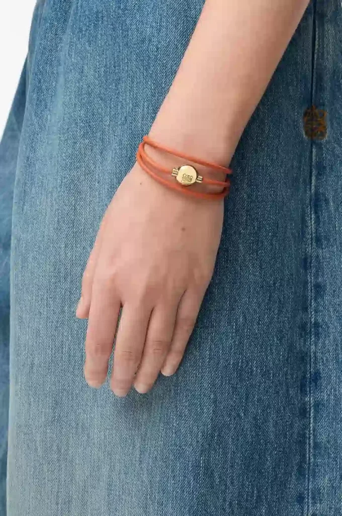 Pulsera Pebble de piel de becerro naranja/dorada Pulsera Pebble de piel de becerro naranja/dorada