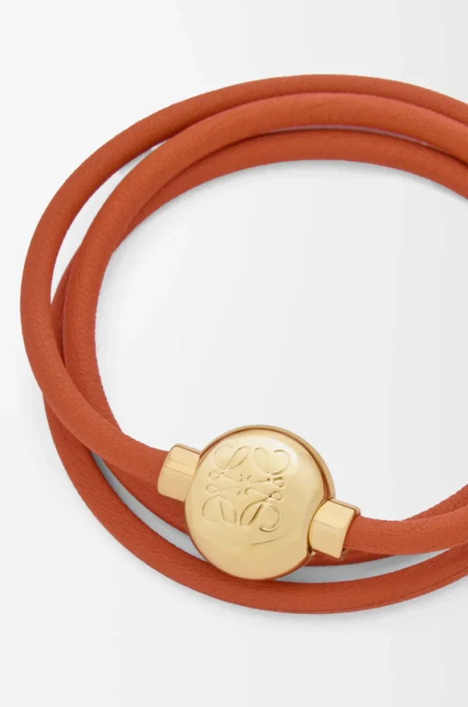 Pulsera Pebble de piel de becerro naranja/dorada Pulsera Pebble de piel de becerro naranja/dorada
