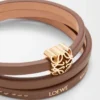 Pulsera trenzada Anagram Bombé en piel de becerro Cocoa Pulsera trenzada Anagram Bombé en piel de becerro Cocoa