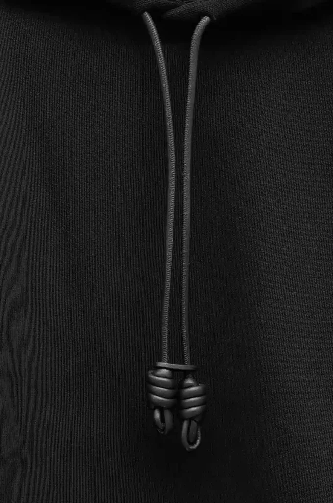 Sudadera con capucha de corte holgado en algodón negro Sudadera con capucha de corte holgado en algodón negro