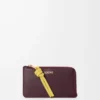 Tarjetero con nudo en piel de becerro napa brillante Dark Burgundy/Light Citrine