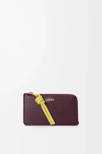 Tarjetero con nudo en piel de becerro napa brillante Dark Burgundy/Light Citrine Tarjetero con nudo en piel de becerro napa brillante Dark Burgundy/Light Citrine