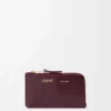 Tarjetero monedero en piel de becerro lisa y granulada Dark Burgundy Tarjetero monedero en piel de becerro lisa y granulada Dark Burgundy
