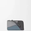 Tarjetero monedero Puzzle en piel de becerro clásica gris asfalto/azul tormenta