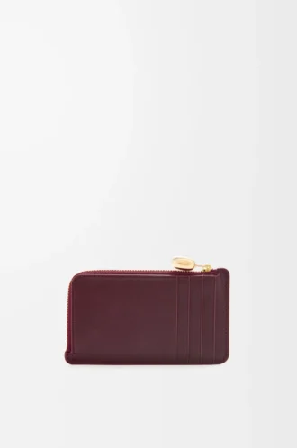 Tarjetero Pebble en piel de becerro napa brillante Burgundy