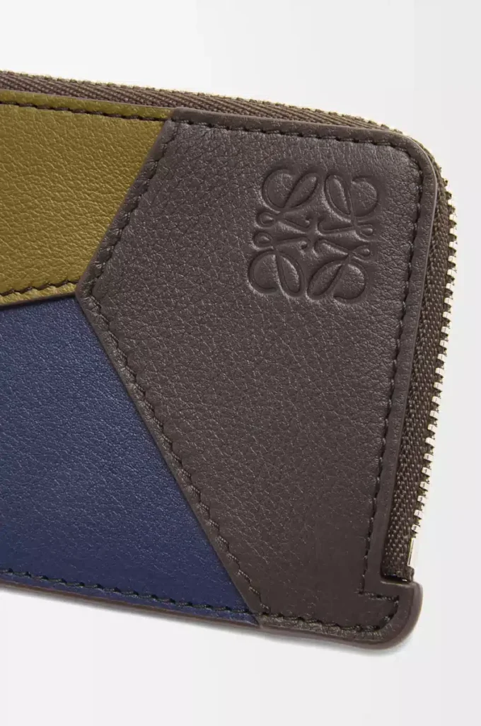 Tarjetero Puzzle para monedas en piel de becerro clásica color oliva/marrón oscuro