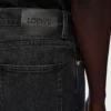 Vaqueros de pierna recta en denim negro lavado Vaqueros de pierna recta en denim negro lavado